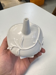 A Chinese Dehua blanc de Chine 'Pomegranate' teapot and cover, Kangxi
