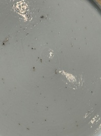 A pair of fine Chinese famille rose black-ground 'Scrolls and Flowers' plates, Yongzheng/Qianlong
