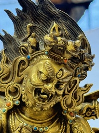 A fine Sino-Tibetan gilt-bronze figure of Mahakala, 18th C.