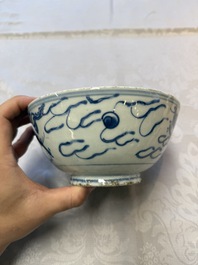 A Chinese blue and white 'Dragons and Clouds' bowl, Jiajing/Wanli