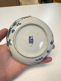 Five Chinese blue and white 'Phoenix' saucers, Wanli mark and of the period