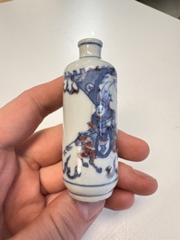 Two Chinese blue, white and copper-red snuff bottles with narrative design, 19th C.