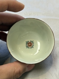 Two Dutch-decorated Chinese cups and saucers with parrots among flowering branches, 18th C.