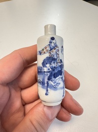 Three Chinese blue, white and copper-red snuff bottles with narrative design, 19th C.