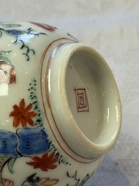 Two Dutch-decorated Chinese cups and saucers with parrots among flowering branches, 18th C.