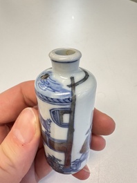 Two Chinese blue, white and copper-red snuff bottles with narrative design, 19th C.