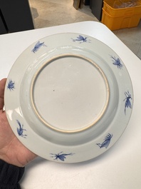 A Chinese blue and white 'La Dame au Parasol' plate after Cornelis Pronk, Qianlong