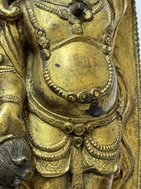A fine Sino-Tibetan gilt-bronze figure of Mahakala, 18th C.