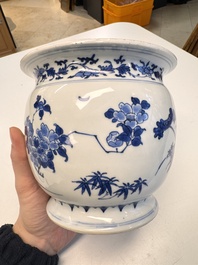 A Chinese blue and white 'Floral' chamber pot, Transitional period