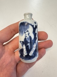 Two Chinese blue, white and copper-red snuff bottles with figural design, 19th C.