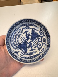 Five Chinese blue and white 'Phoenix' saucers, Wanli mark and of the period