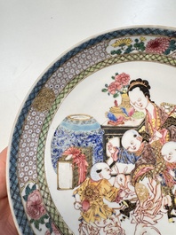 A fine Chinese famille rose eggshell plate with a lady and playing boys, Yongzheng