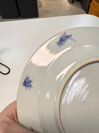 A Chinese blue and white 'La Dame au Parasol' plate after Cornelis Pronk, Qianlong