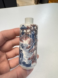 A fine Chinese blue, white and copper-red snuff bottle with narrative design, 19th C.