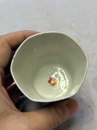 A pair of Chinese gilt-decorated powder-blue-ground 'Antiquities' cups and saucers, lingzhi mark, Kangxi