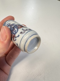 Two Chinese blue, white and copper-red snuff bottles with narrative design, 19th C.