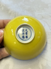 A pair of fine Chinese lemon-yellow-glazed tea bowls, Yongzheng mark, 19th C.