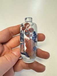 A fine Chinese blue, white and copper-red 'Yu Lou Fu Zhao 玉樓赴召' snuff bottle, 19th C.