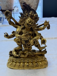 A fine Sino-Tibetan gilt-bronze figure of Mahakala, 18th C.