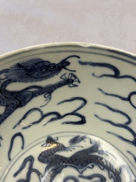 A Chinese blue and white 'Dragons and Clouds' bowl, Jiajing/Wanli