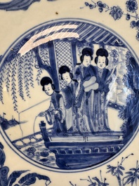 A fine Chinese blue and white 'Elegant Beauties' dish with raised central medallion, Kangxi