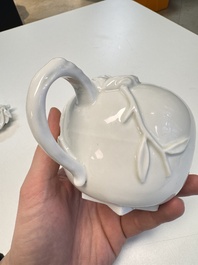 A Chinese Dehua blanc de Chine 'Pomegranate' teapot and cover, Kangxi