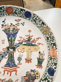 A pair of Chinese famille verte 'Antiquities' dishes, Kangxi