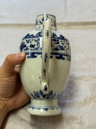 A Chinese blue and white 'Floral' jug, Transitional period