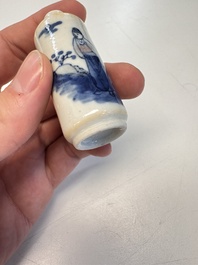 Two Chinese blue, white and copper-red snuff bottles with figural design, 19th C.