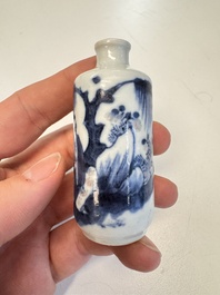 Two Chinese blue, white and copper-red snuff bottles with figural design, 19th C.