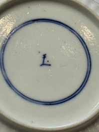 A pair of Chinese famille verte cups and saucers with floral design, Jade 玉 marks, 19th C.