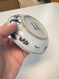 Five Chinese blue and white 'Phoenix' saucers, Wanli mark and of the period