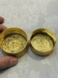 A fine Tibetan gilt-bronze box and cover with repouss&eacute; scroll decoration, 18th C.