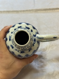 A Chinese blue and white 'Floral' jug, Transitional period