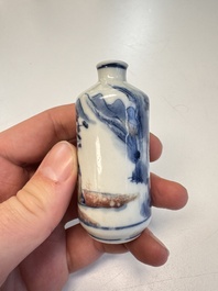 Three Chinese blue, white and copper-red snuff bottles with narrative design, 19th C.