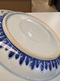 A fine Chinese blue and white 'Elegant Beauties' dish with raised central medallion, Kangxi