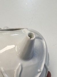 A Chinese Dehua blanc de Chine 'Pomegranate' teapot and cover, Kangxi