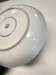 A pair of Chinese famille verte 'Antiquities' dishes, Kangxi