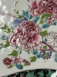 A pair of fine Chinese famille rose black-ground 'Scrolls and Flowers' plates, Yongzheng/Qianlong