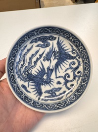 Five Chinese blue and white 'Phoenix' saucers, Wanli mark and of the period
