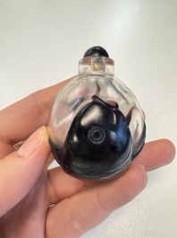 Two Chinese glass snuff bottles and a buffalo bone snuff bottle, Xianfeng mark, 19th C.
