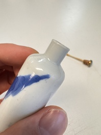 Four Chinese blue and white snuff bottles, 19th C.