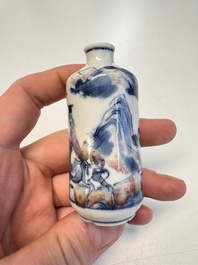 Three Chinese blue, white and copper-red snuff bottles with narrative design, 19th C.
