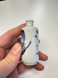 Two Chinese blue, white and copper-red snuff bottles with figural design, 19th C.