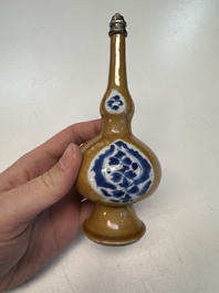 A Chinese blue and white capucine-ground rosewater sprinkler with silver mount, Kangxi