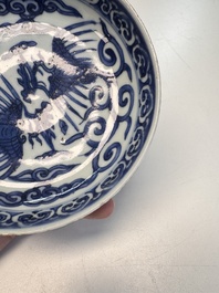 Five Chinese blue and white 'Phoenix' saucers, Wanli mark and of the period