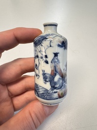 Three Chinese blue, white and copper-red snuff bottles with narrative design, 19th C.
