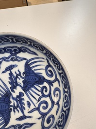 Five Chinese blue and white 'Phoenix' saucers, Wanli mark and of the period