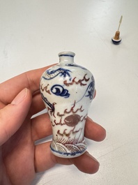 A Chinese blue, white and copper-red 'Dragon' snuff bottle, 19th C.
