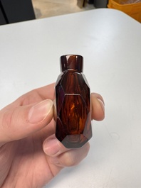 A Chinese facetted amber glass snuff bottle, 19th C.